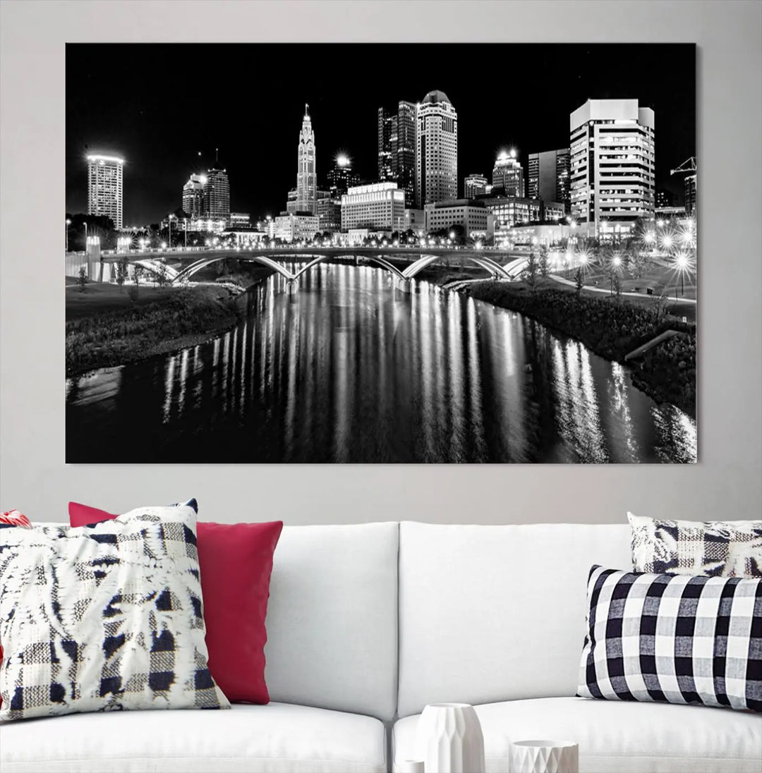 The living room showcases the Columbus City Lights Skyline Black and White Wall Art Cityscape Canvas Print.