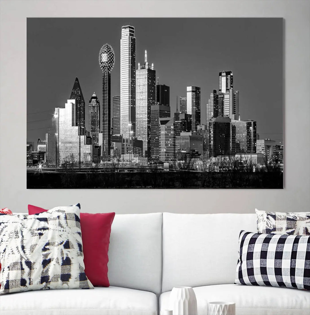 A black and white triptych of the Dallas city skyline is displayed, crafted on museum-quality canvas. This wall art piece is ready to hang, with each component adorned with a UV-protective coating to maintain its captivating appeal.