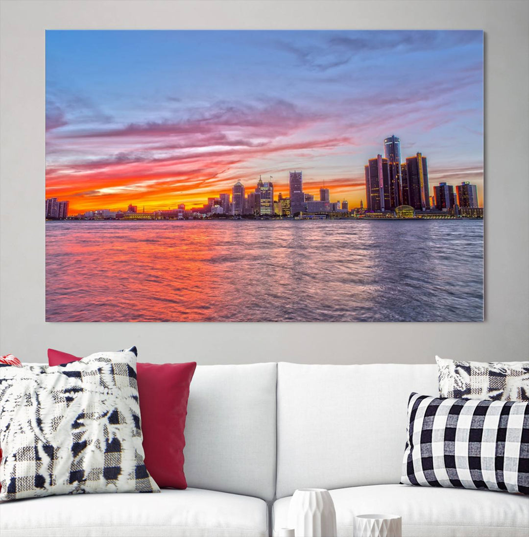 The Detroit City Lights Sunset Colorful Cloudy Skyline Cityscape View Wall Art Canvas Print showcases a vibrant city skyline at sunset over water. The artwork is museum-quality, comes ready to hang, and features a UV-protective coating to preserve its vivid colors.