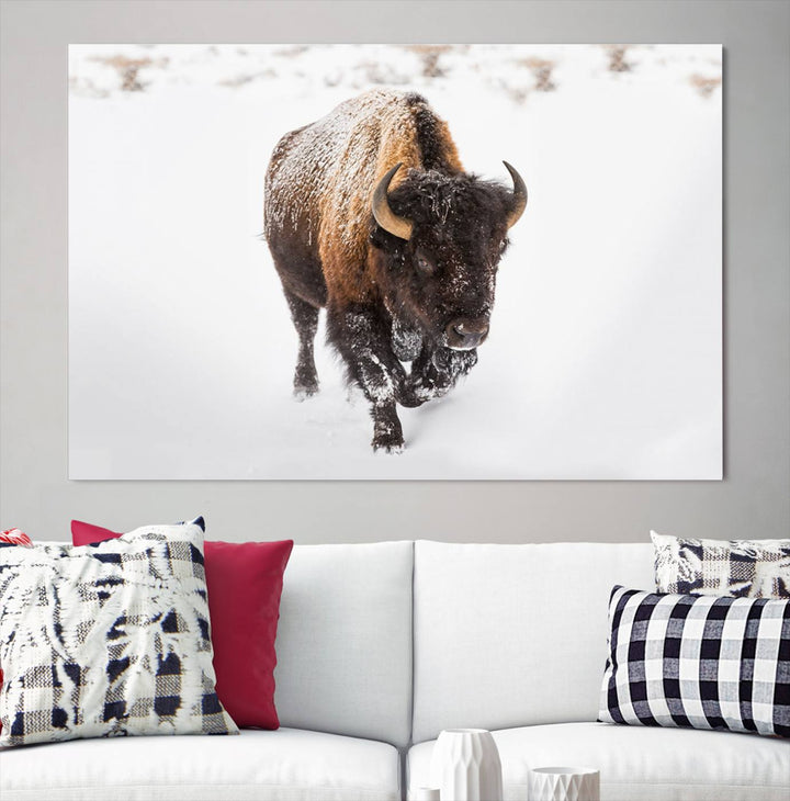 The Bison Winter Wall Art Canvas Print for Farmhouse Decor is displayed as a triptych in the living room. This artwork, printed on museum-quality canvases with a UV-protective coating to maintain its vibrant colors, is the focal point of the space.