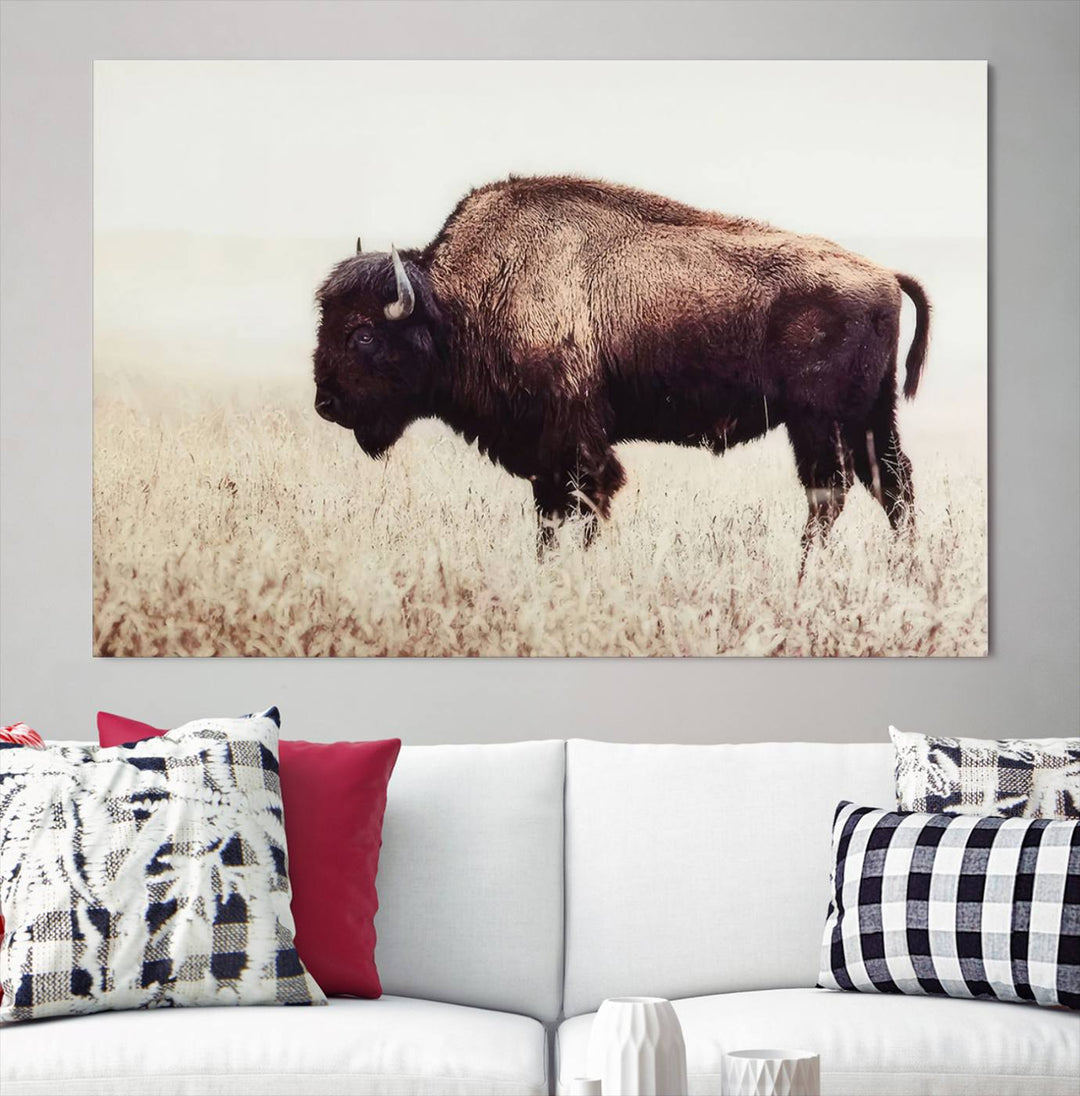 A stylish living room showcases the captivating "Bison in Field" Wall Art Canvas Print as farmhouse decor.