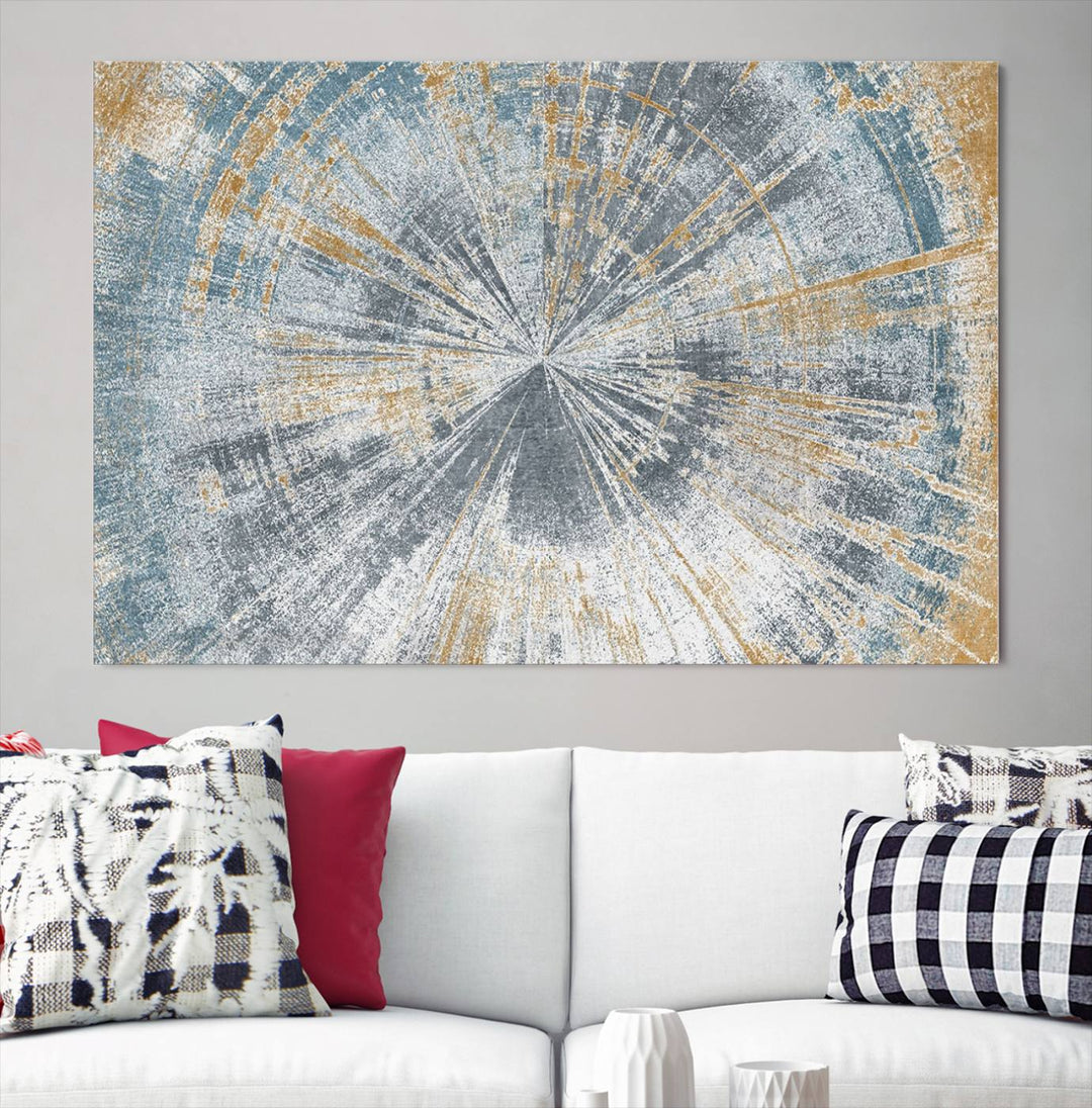 The Radiant Abstract Wood Rings Canvas Art, a modern triptych wall decor, enhances the contemporary style of the living room with its blue, white, and gold hues.