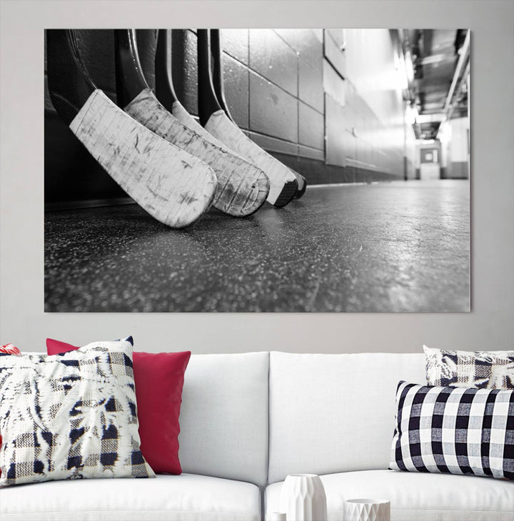 A living room featuring a large Ice Hockey Wall Art Canvas Print on gallery-wrapped canvas.