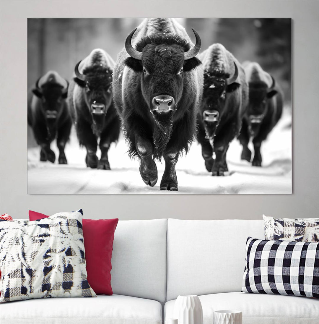 A modern living room features a striking black-and-white American Bison Art | Buffalo Herd Wall Art Canvas Print on the wall.