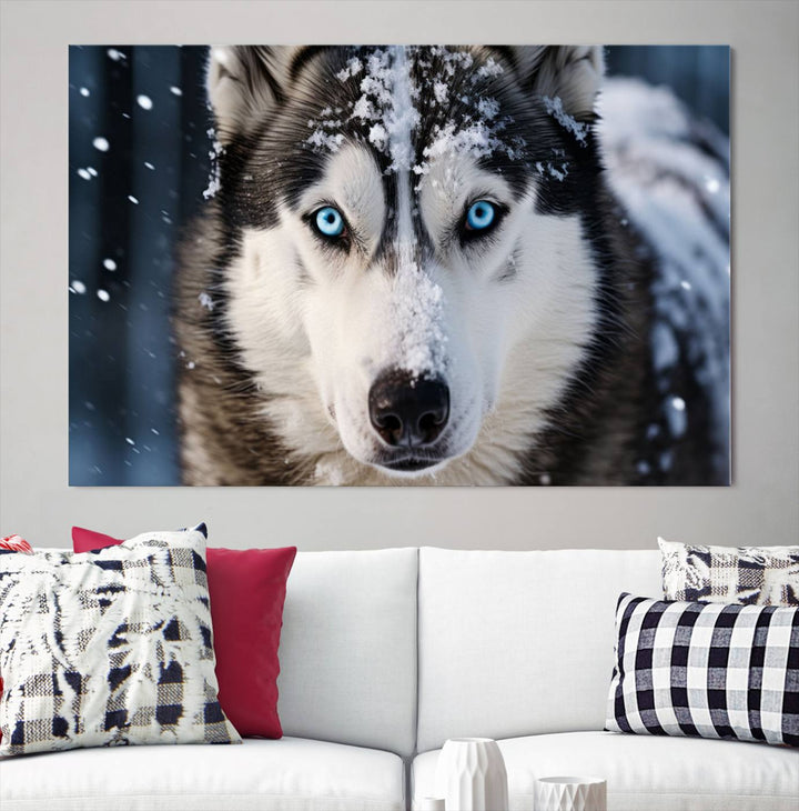 A digital art piece titled "Winter Siberian Husky Wolf Wall Art Canvas Print" showcases a blue-eyed husky blanketed in snow. Printed on high-quality canvas, it is an ideal choice for nature and dog enthusiasts.