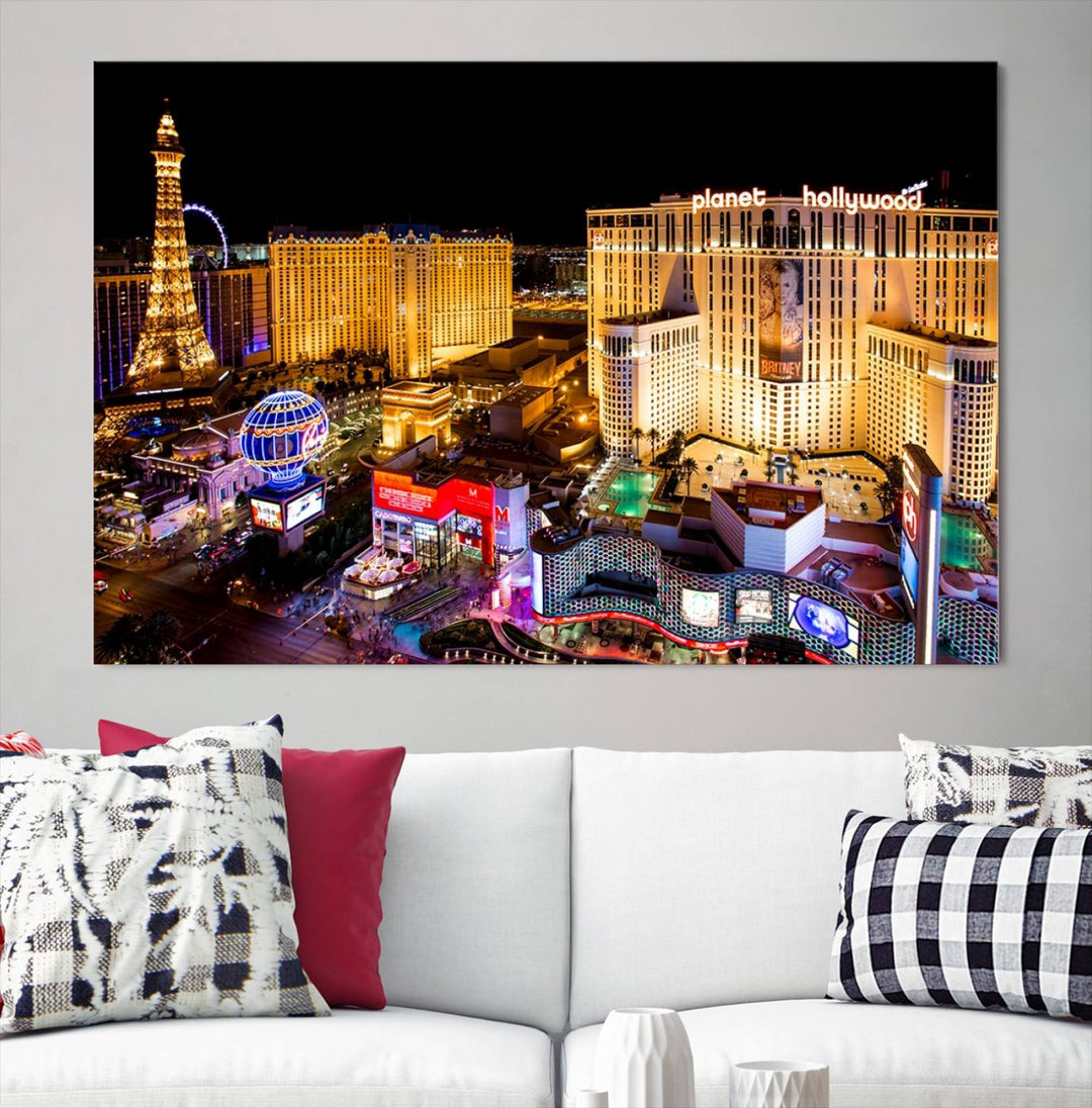 The Las Vegas Wall Art Canvas Print is a triptych set that showcases a stunning night view of Las Vegas. The illuminated buildings and the iconic faux Eiffel Tower add elegance to any space. Each piece comes with a UV-protective coating and is ready to hang, ensuring both style and durability.