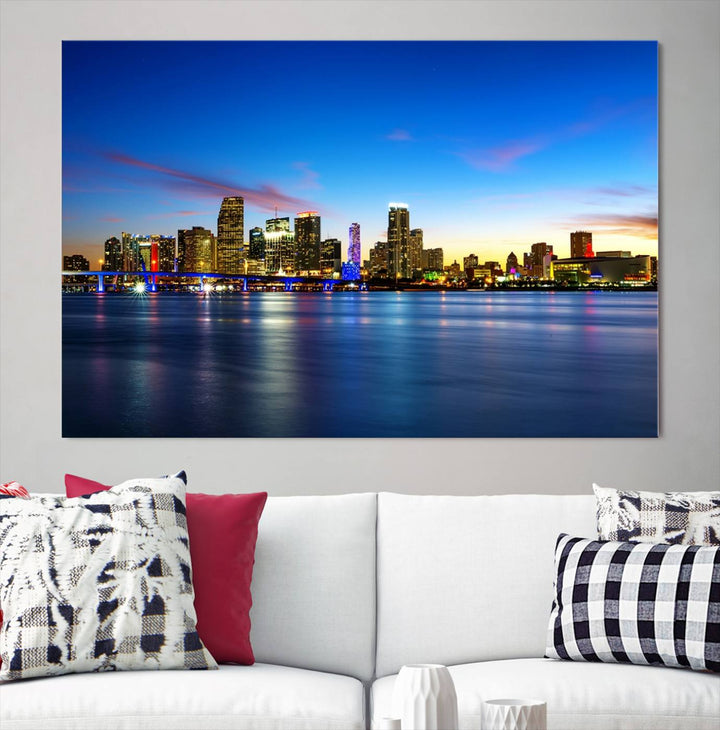 The living room features a Miami City Wall Art Canvas Print—a gallery-wrapped triptych displaying a city skyline at dusk, adding museum-quality elegance to the space.