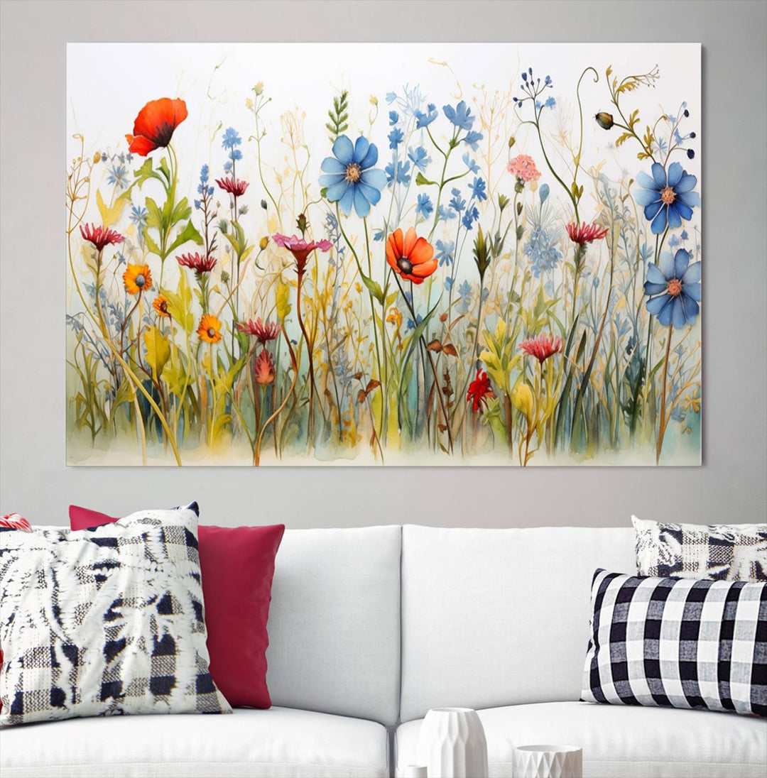 The Colorful Wildflower Canvas Wall Art – Vibrant Floral Botanical Print, consisting of a large 3 panel set, adds bright nature decor to the living room against a black wall.