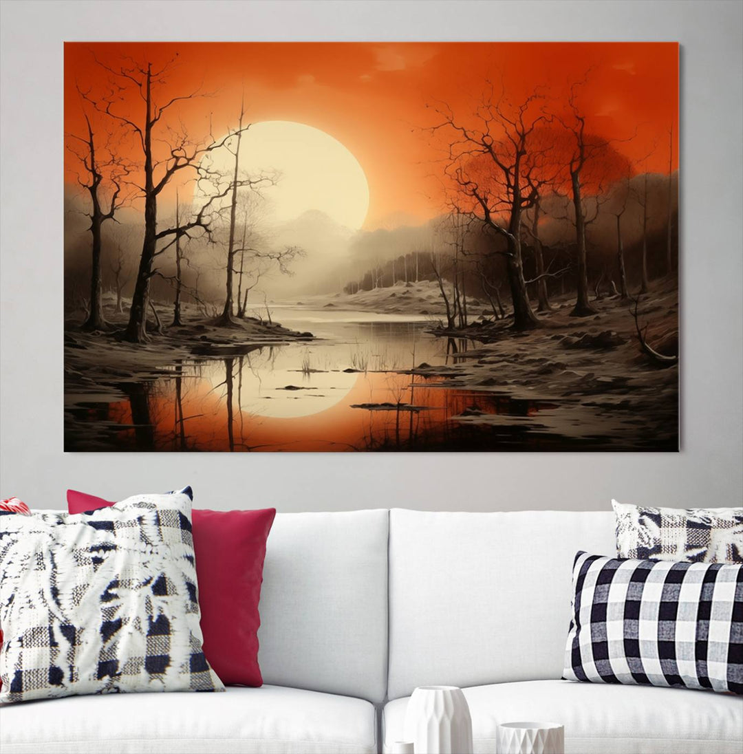 The "Abstract Watercolor Trees and Sunset on Lake Wall Art" is a triptych masterpiece, showcasing an orange-hued landscape of barren trees and a large sun. Displayed on museum-quality canvases with UV-protective coating, it creates a striking visual element in any space.