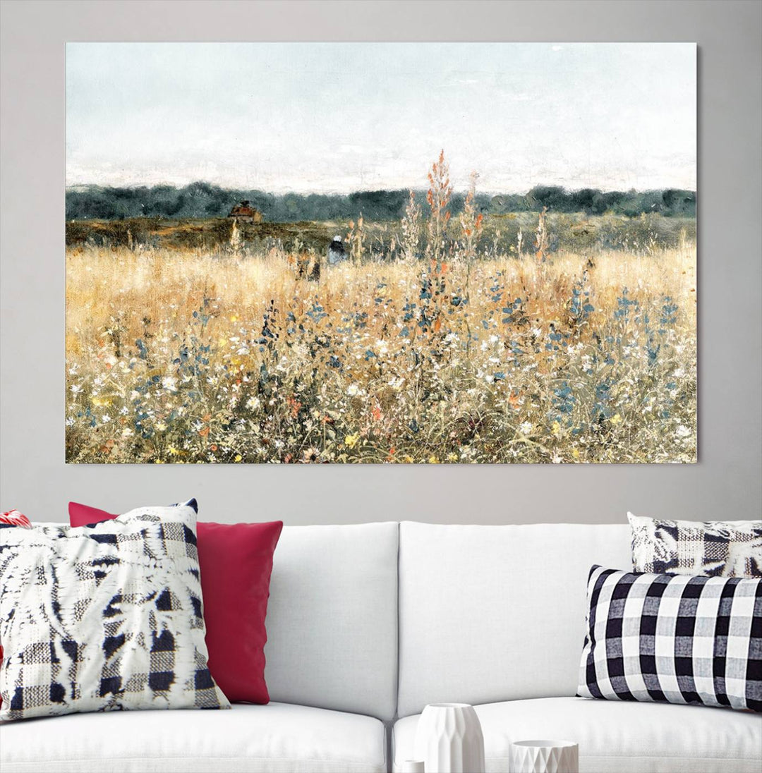 The "Wildflower Field Wall Art Canvas" brings rustic charm to the room with its nature-inspired landscape print, making it a perfect addition to the living room or office.