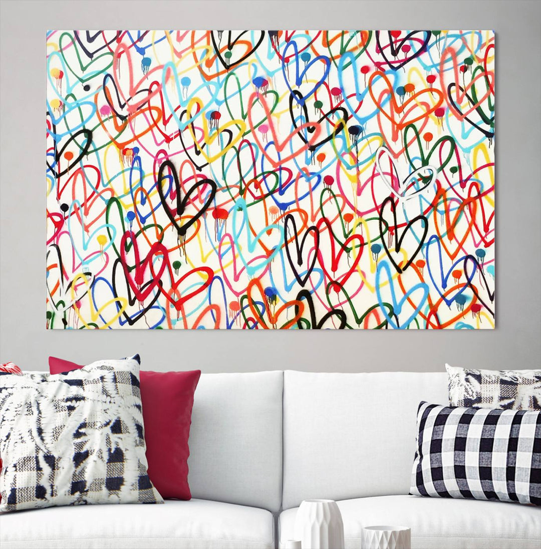 The "Colorful Love Canvas print," featuring vibrant abstract street art with overlapping loops, is handmade in the USA.