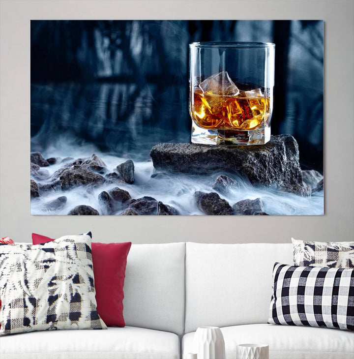 The Whiskey Ice Wall Art Canvas Print, a triptych featuring a glass of whiskey on the rocks, is crafted with a gallery-quality finish on premium canvas.