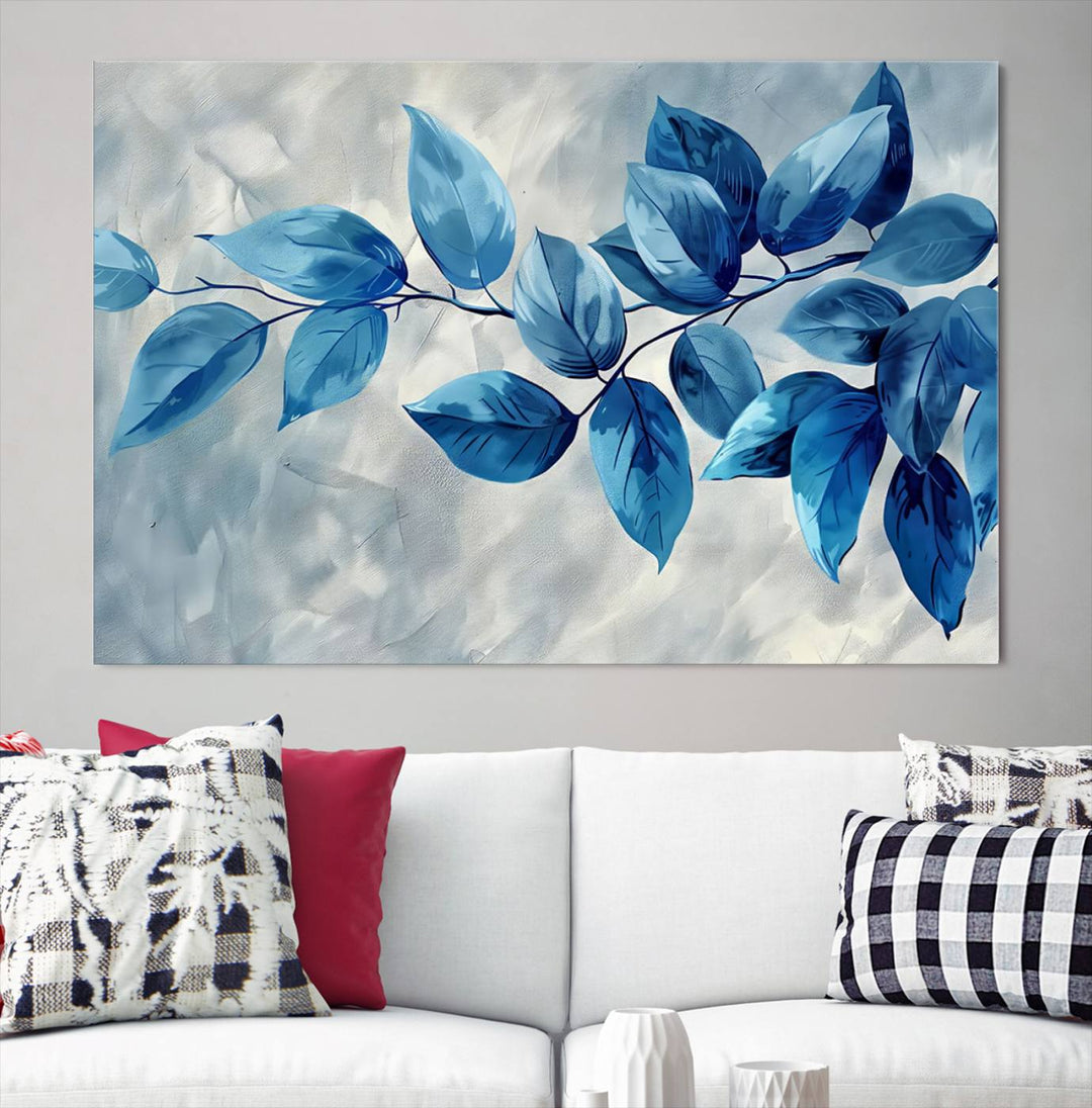 A Blue Leaf Abstract Wall Art Canvas Print, featuring a textured background and gallery-quality finish, is displayed.