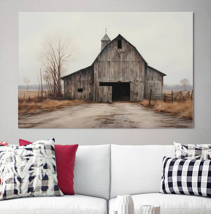 A framed and ready-to-hang Farmhouse Rustic Barn Wall Art Canvas Print is displayed against a gray wall. This stylish modern living room seamlessly combines rural life wall décor with contemporary comfort.