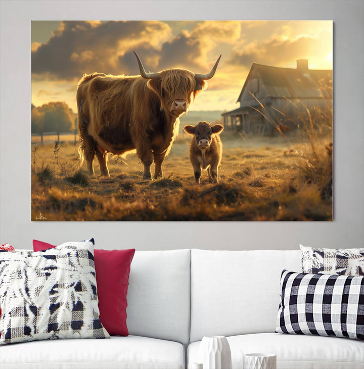 The "Highland Baby Cow Canvas Wall Art Animal Print" triptych art piece showcases a cow and calf in a sunlit field with a barn in the background.