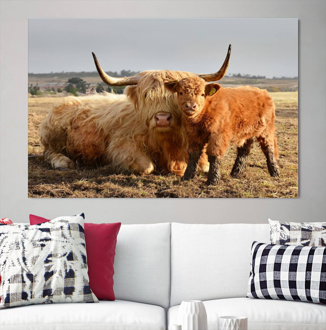 The three-panel canvas artwork, titled "Highland Cow Canvas Wall Art Animal Print for Farm House Decor," features a serene scene of a resting Highland cow and calf in a field. The piece highlights its gallery-quality finish.