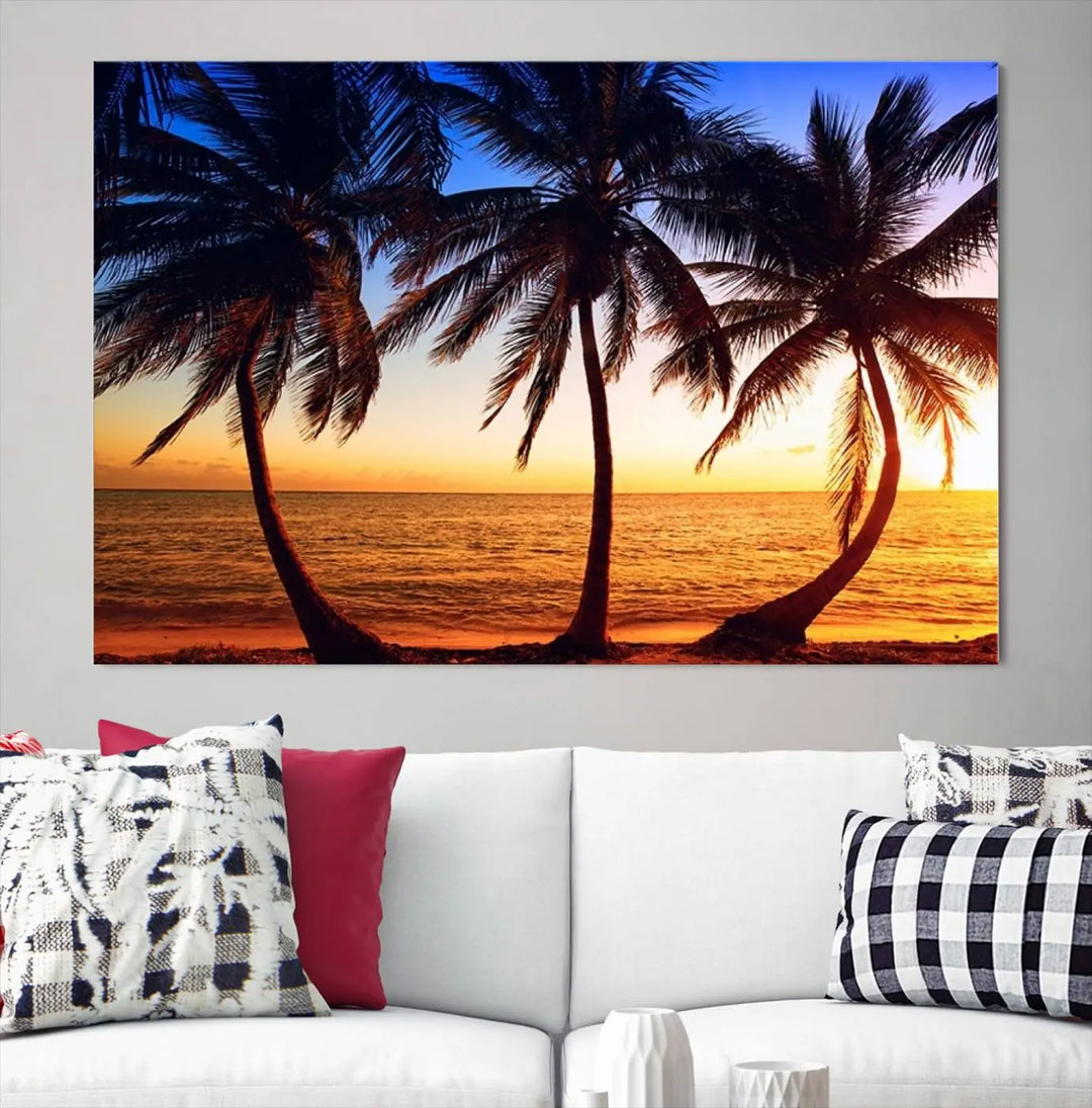 The living room features a wall adorned with the "Wall Art Canvas Curve Palms at Sunset on Beach," showcasing gallery-wrapped, museum-quality canvases in a stunning triptych.