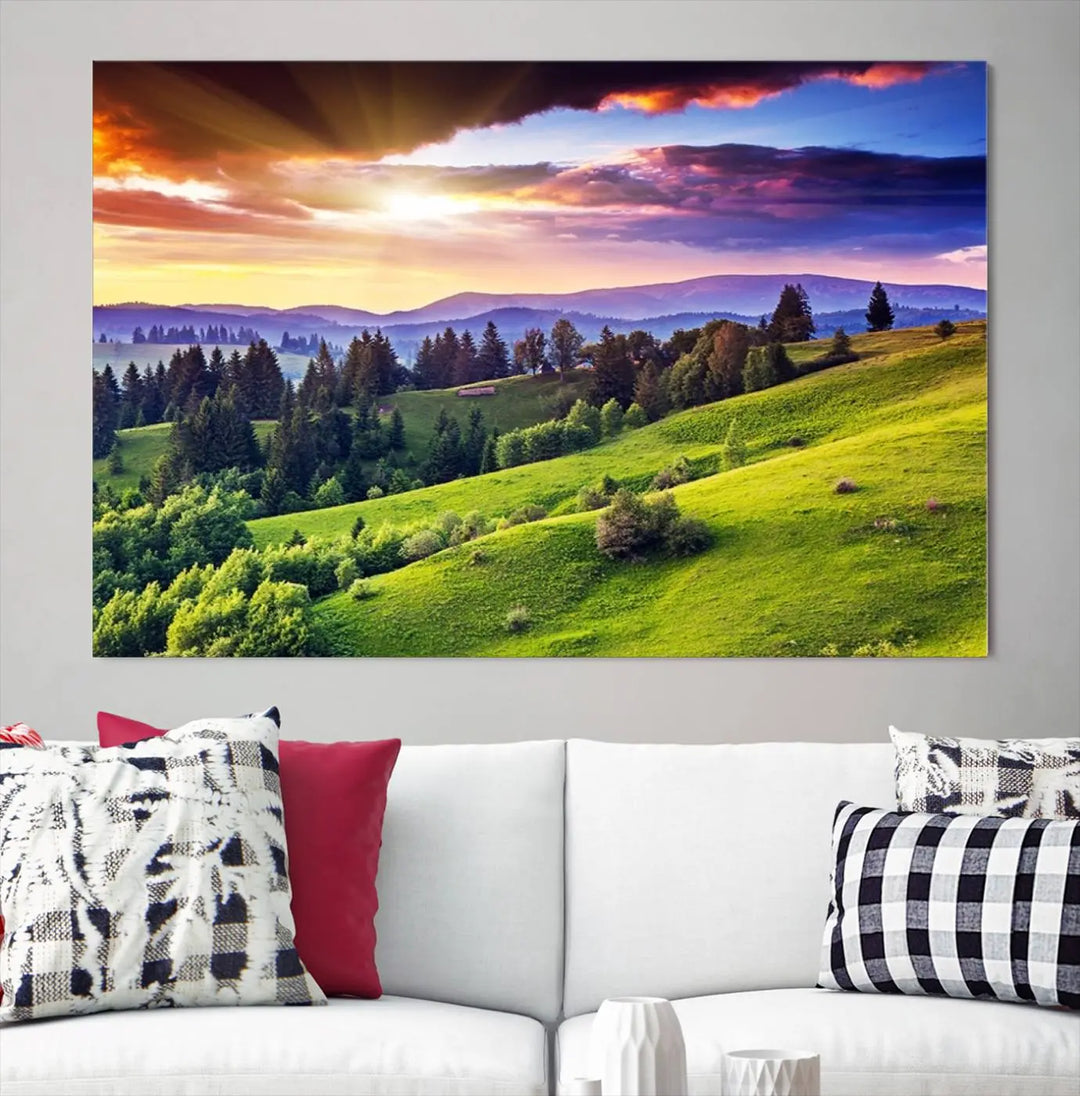 The room features a large triptych of the Green Hills and Sunset Wall Art Print, showcasing a scenic landscape with lush greenery and a vibrant sky.