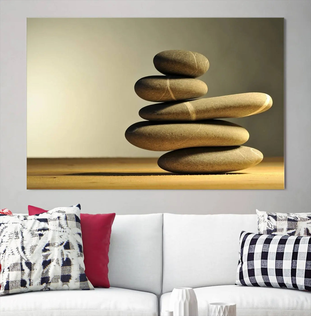 The "Yellow Zen Stones on Yellow Background Wall Art Yoga Zen Artwork," a professionally hand-assembled framed photo with UV-protective coating, is displayed on the wall.