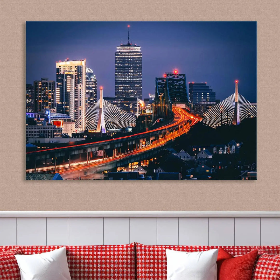 The "Boston City Lights Night Skyline Cityscape View" artwork on the wall showcases a brightly lit bridge at night. It is displayed on museum-quality canvas with a UV-protective coating.