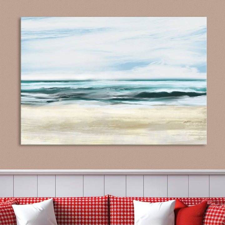 The room features the Ocean Abstract Wall Art Canvas Print, a triptych beach painting on museum-quality canvas with a gallery-wrapped finish and UV-protective coating.