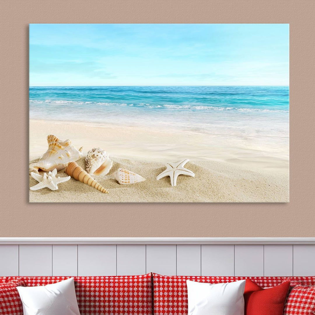 The "Turquoise Ocean View Seashell Starfish on the Beach Canvas Print Artwork" is a triptych piece that showcases a tranquil beach scene, complete with seashells and starfish adorning the sand. It is elegantly gallery-wrapped on museum-quality canvas.