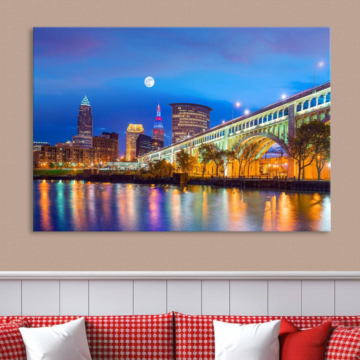 The Cleveland Night Skyline Wall Art City Cityscape Canvas Print portrays a city skyline and bridge lit up against the night sky. This artwork is printed on museum-quality canvas with a gallery-wrapped finish and features a UV-protective coating to ensure lasting vibrancy.