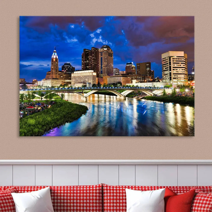 Columbus City Lights Night Bright Blue Cloudy Skyline Cityscape View Wall Art Canvas Print, gallery wrapped on museum-quality canvas, reflecting on a river.