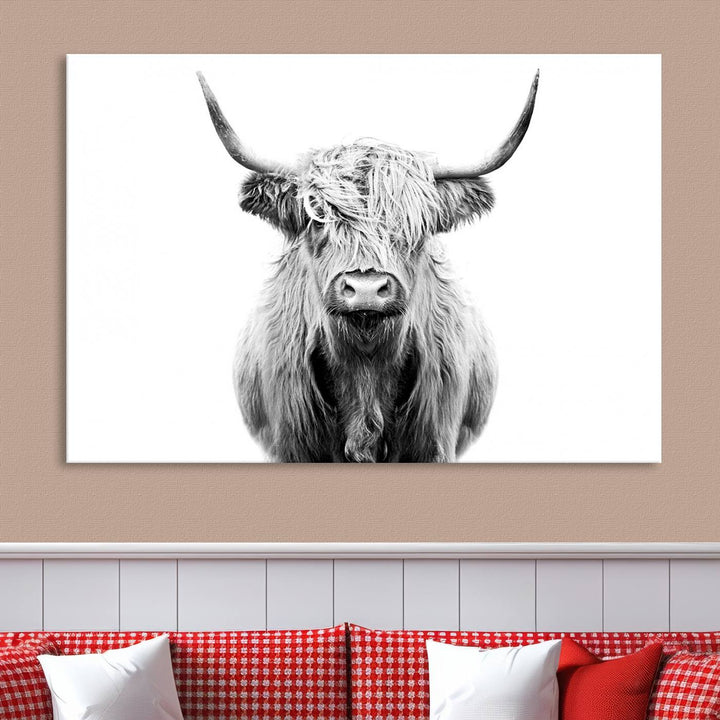 The wall art features a triptych of a Scottish Highland cow, printed on museum-quality canvases with a UV-protective coating. This decorative piece is known as the Highland Cow Canvas Wall Art Farm House Wall Art.