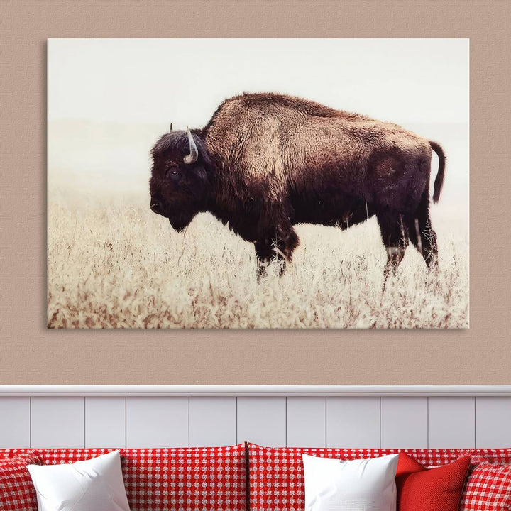 A stylish living room showcases the captivating "Bison in Field" Wall Art Canvas Print as farmhouse decor.