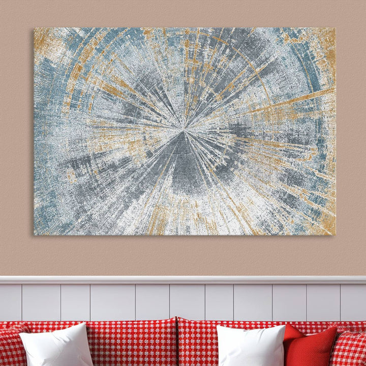 The Radiant Abstract Wood Rings Canvas Art, a modern triptych wall decor, enhances the contemporary style of the living room with its blue, white, and gold hues.