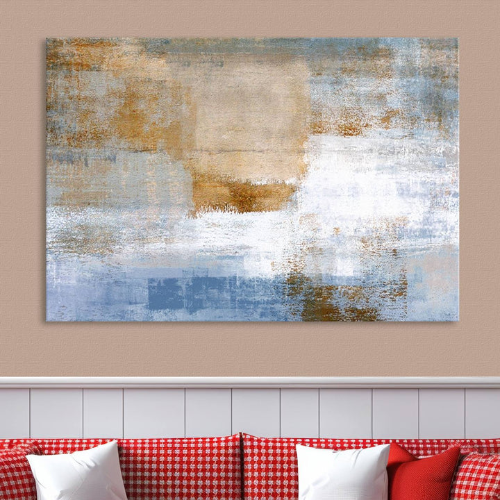 The Blue Multi Panel Abstract Wall Art Canvas Print, featuring an elegant blend of blue, beige, and brown tones, hangs gracefully on the wall, adding a contemporary touch to the space.