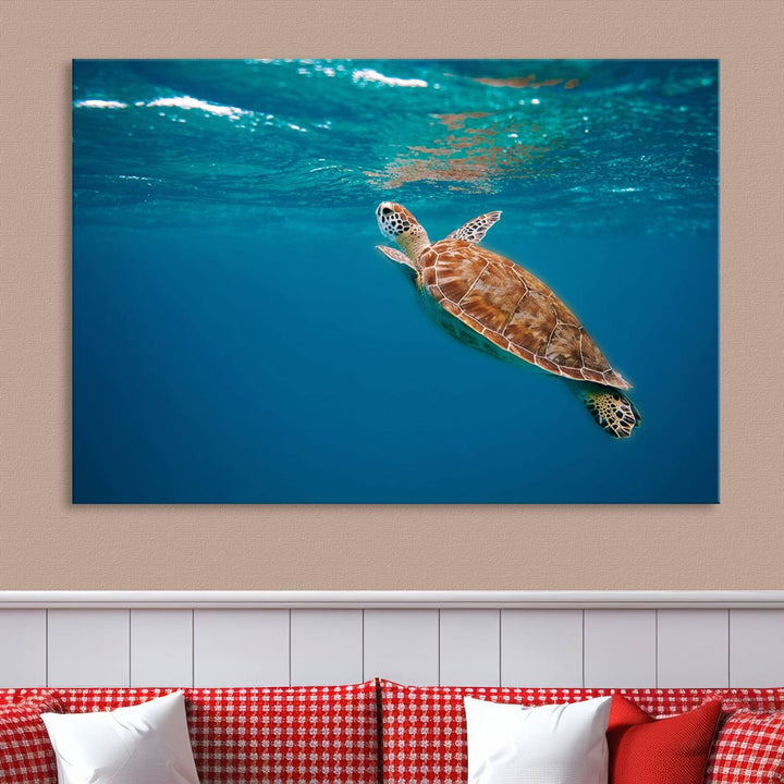 The living room features the "Baby Turtle in Ocean" wall art canvas print. This gallery-quality piece, depicting a sea turtle swimming underwater, adds an elegant touch to the space.