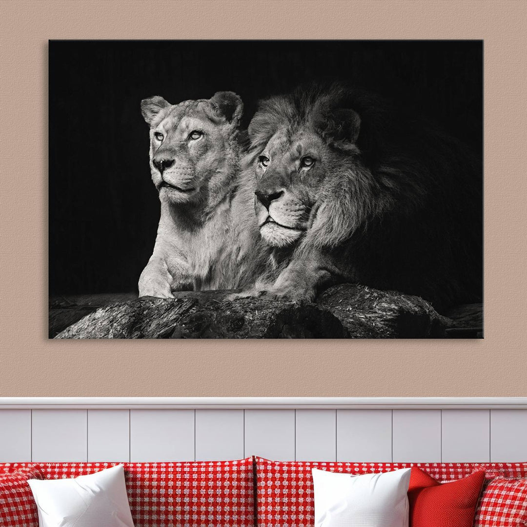 The elegant wildlife portrait, "Lion Couple Canvas Wall Art Print," featuring a black and white depiction of a lion family, majestically decorates the living room wall.