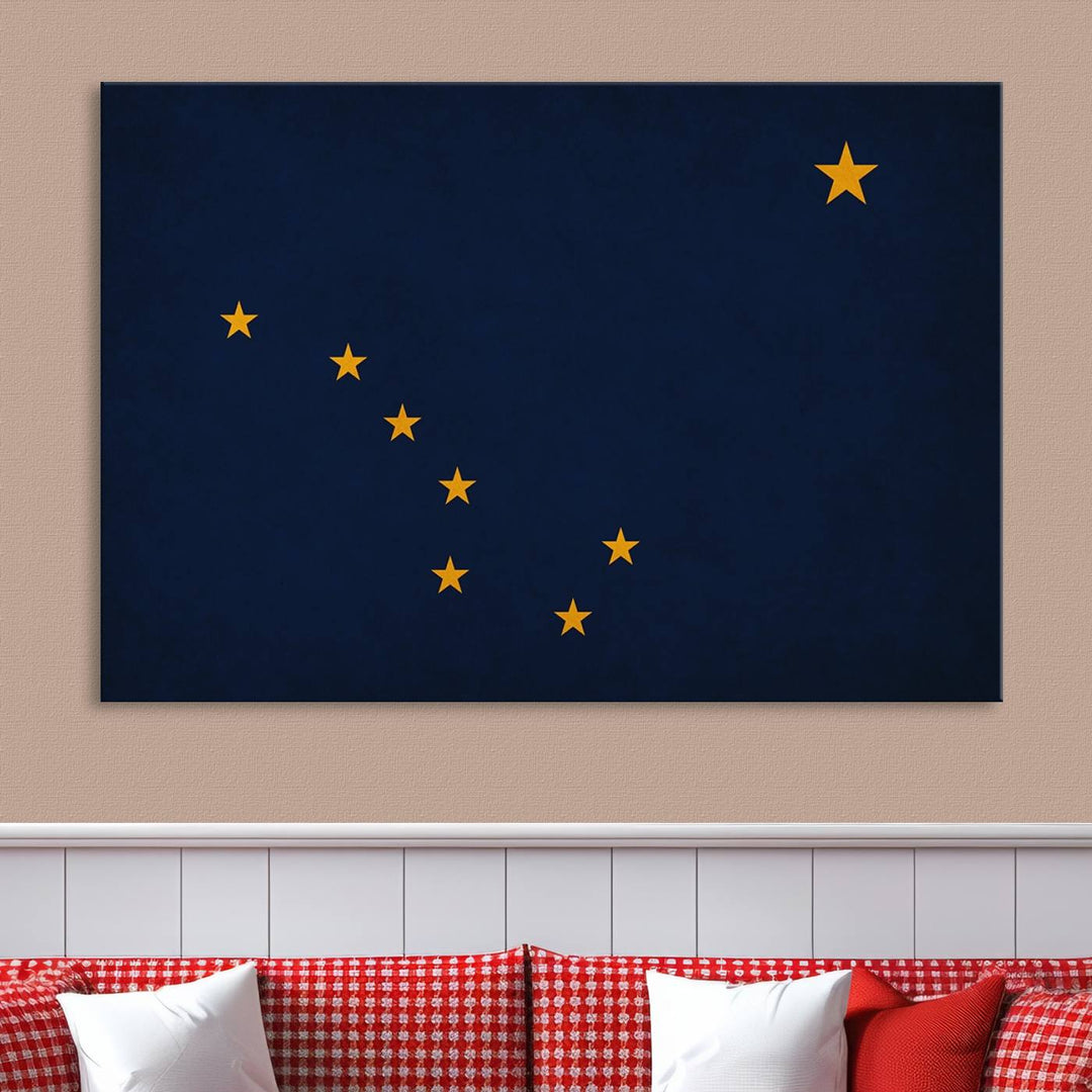 A contemporary living room featuring a triptych artwork of stars on a navy background, accentuated by the striking Alaska States Flag Wall Art Canvas Print.