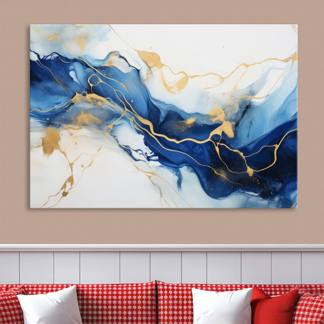 The Blue Abstract Wall Art is displayed as a triptych on museum-quality canvas, showcasing a blue and gold abstract design. The artwork includes a UV-protective coating to maintain its vibrancy and comes with the benefit of free shipping.