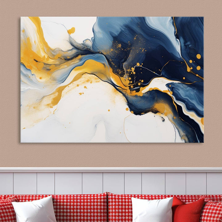 The Blue and Gold Abstract Fluid Canvas Art, with its swirling patterns, adorns the wall. This modern wall art beautifully complements the contemporary interior decor, adding an elegant touch with its rich blue, gold, and white tones.