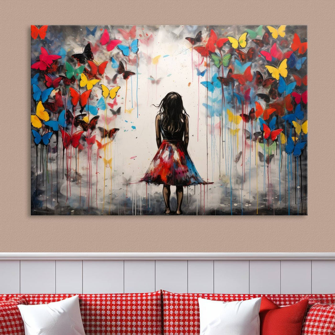 The Girl Butterfly Graffiti Abstract Canvas Print, featuring a vibrant depiction of a girl surrounded by butterflies on museum-quality canvas, is displayed prominently.