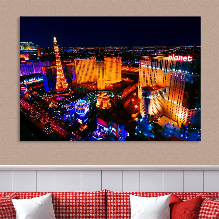 Las Vegas Wall Art Canvas Print showcases a dynamic and luminous cityscape at night with tall buildings and bustling streets. Expertly printed on museum-quality canvas, this gallery-wrapped artwork is enhanced with a UV-protective coating to ensure lasting brilliance.