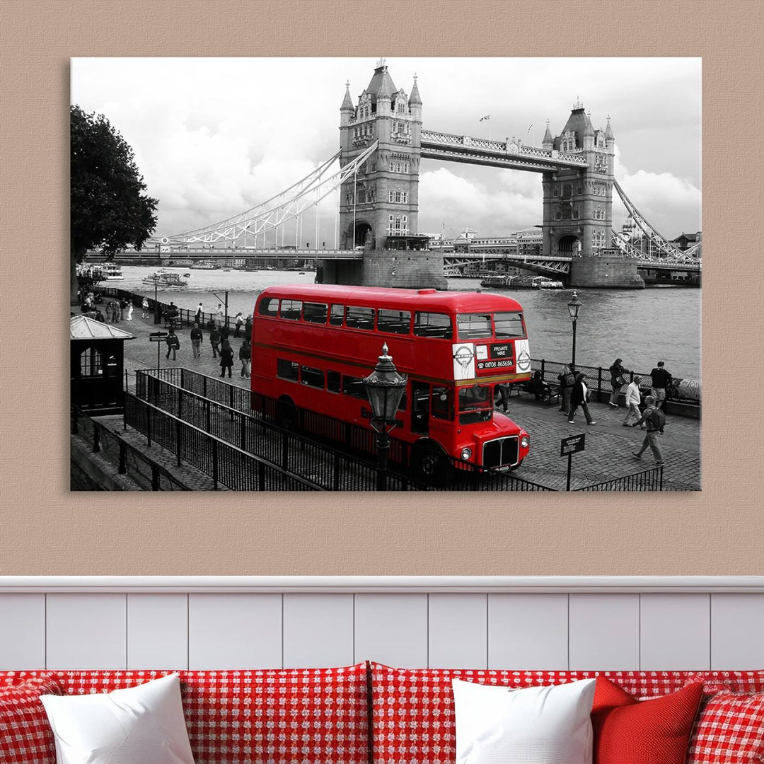 The London Red Bus and Bridge Wall Art Canvas Print showcases a red London bus in front of Tower Bridge, beautifully presented as a gallery-wrapped canvas. This striking image is divided into three panels, delivering a museum-quality display that's ready to hang.