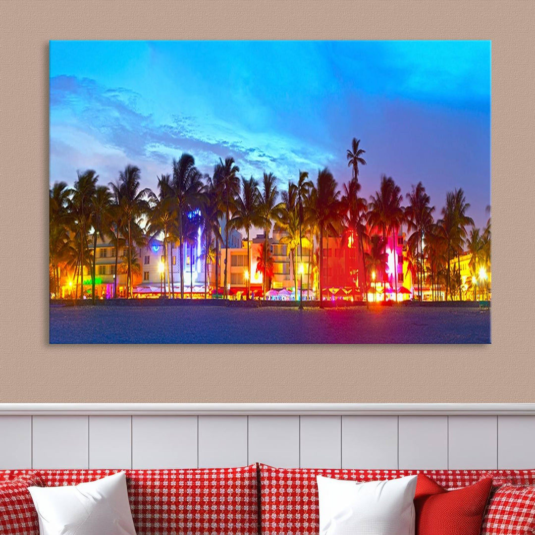 The living room features a three-panel Miami City Wall Art Canvas Print, showcasing a colorful, illuminated beach scene with palm trees on museum-quality canvas.