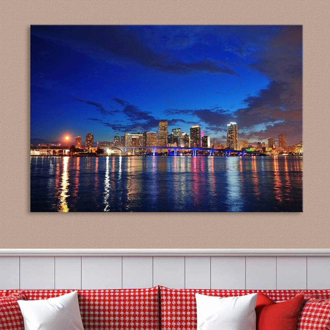 A large Miami City View Wall Art Canvas Print featuring the Miami City Skyline Panorama at night is displayed above the dresser.