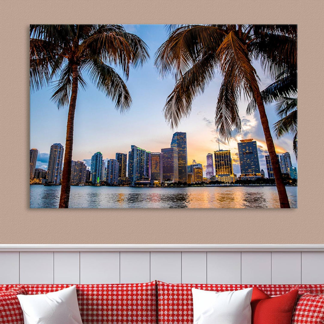 The Wall Art MIAMI Canvas Print features a triptych design depicting palm trees and a city skyline at sunset.