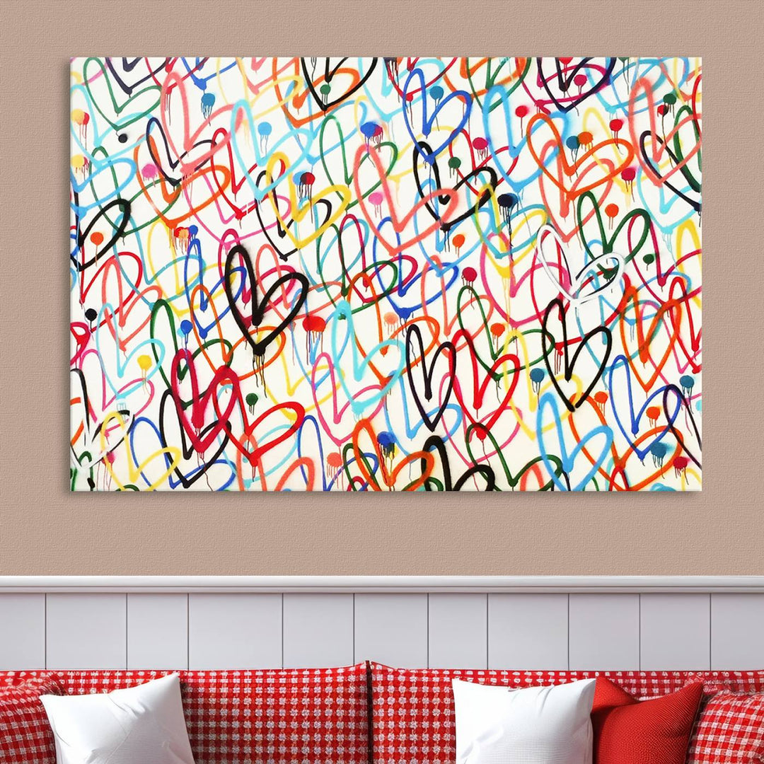 The "Colorful Love Canvas print," featuring vibrant abstract street art with overlapping loops, is handmade in the USA.