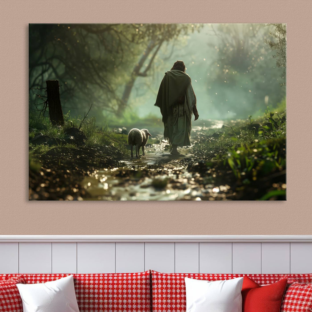 The wall art piece, titled "Jesus Shepherd a Lost Lamb Canvas Wall Art Print," is suspended on the wall and depicts a robed figure and a lamb wandering along a forest path.