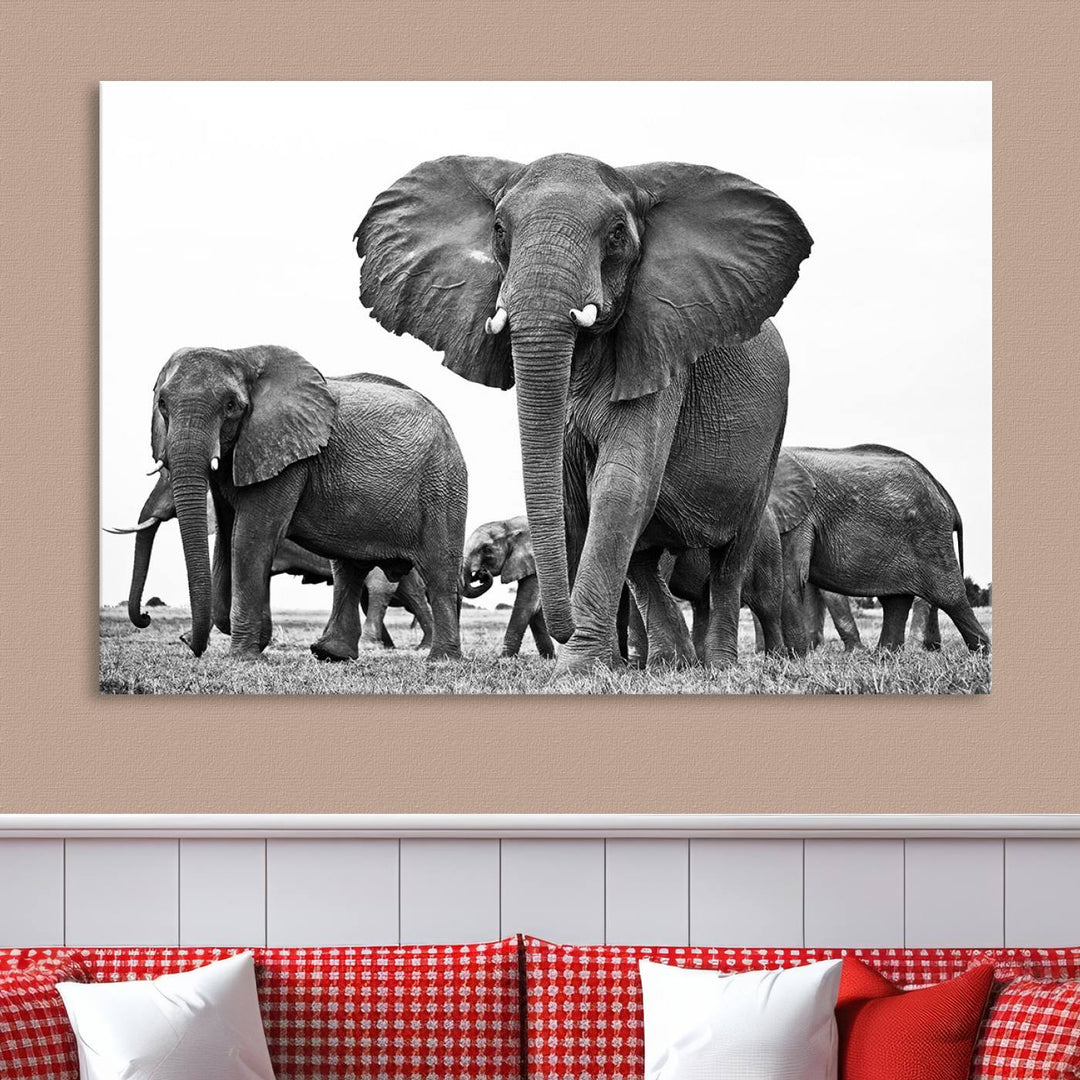 The Black White Elephant Family Wall Art Canvas Print features a triptych of elephants walking in the wild, crafted as gallery-quality wall art on premium canvas.