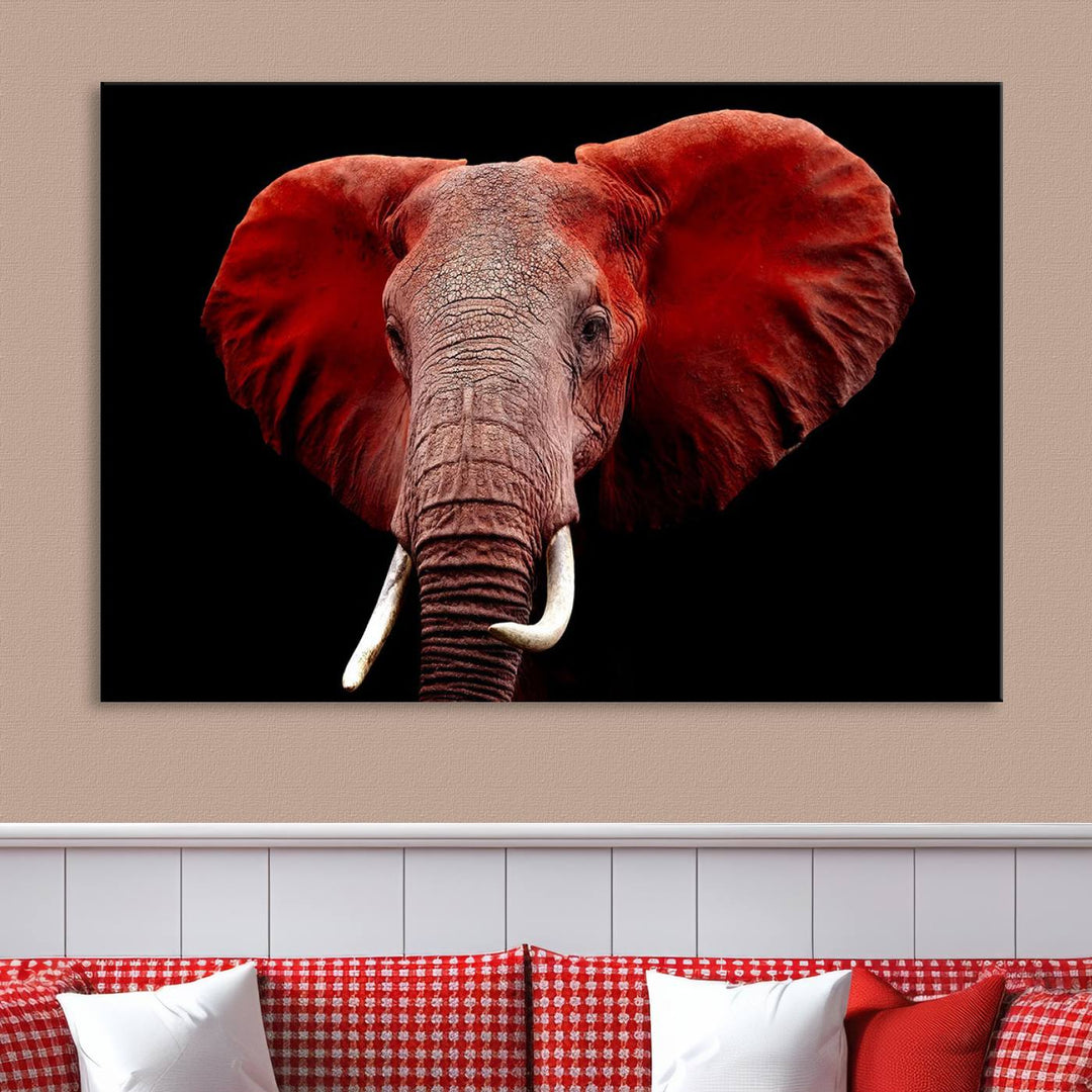 A Wall Art Canvas Print in the modern living room features a three-panel premium design of a red elephant face.