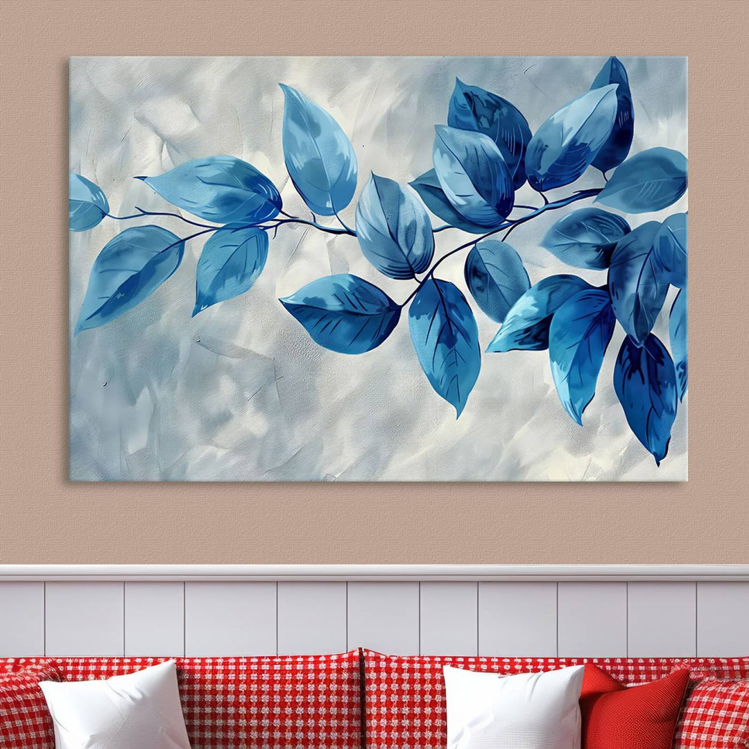 A Blue Leaf Abstract Wall Art Canvas Print, featuring a textured background and gallery-quality finish, is displayed.