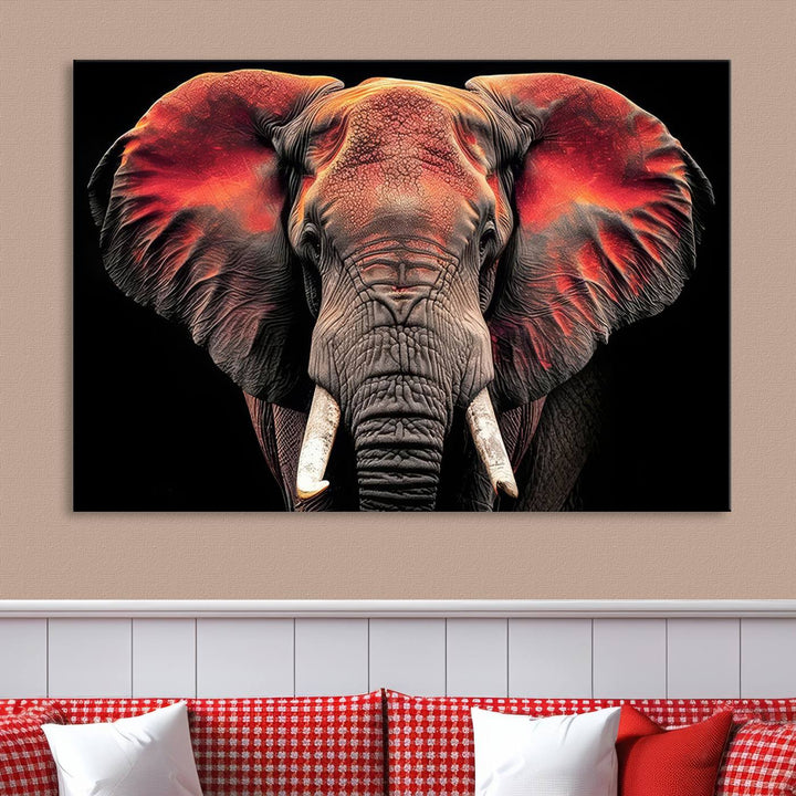 The Elephant Wall Art Canvas Print, featuring vibrant red and black tones, is a stunning artwork printed on museum-quality canvas. It comes with a UV-protective coating.