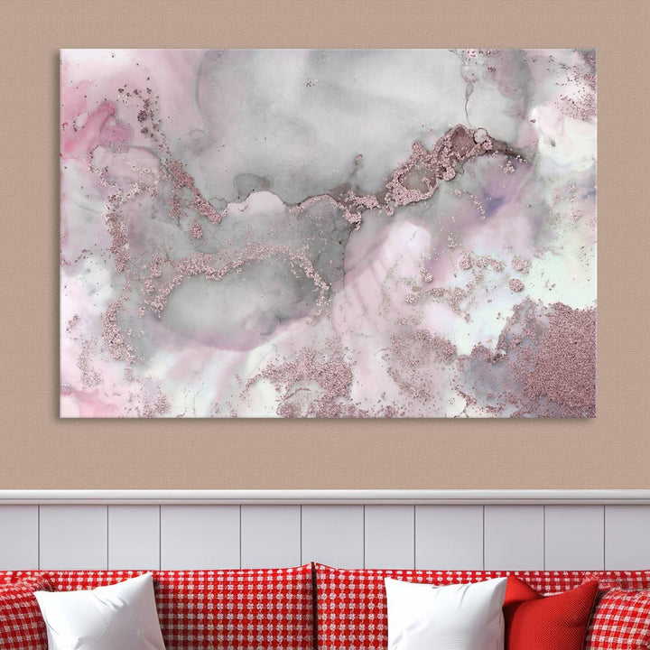 The Rose Marble Abstract Wall Art Canvas Print is a stunning triptych that showcases pink and gray tones, elegantly presented on a dark wall.